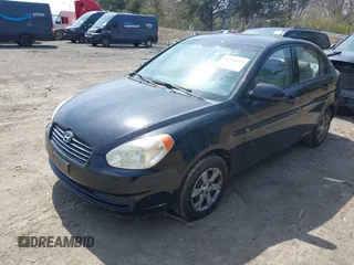 2006 Hyundai Accent GLS with VIN KMHCN46C36U018237, listed as a IAAI auction lot 41916524 with 92,427 mi miles. Bid and sale history available at carsss.com. Image 2.