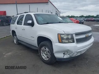 2011 Chevrolet Tahoe LT with VIN 1GNSCBE01BR146546, listed as a IAAI auction lot 39196597 with 206,906 mi miles and . Bid and sale history available at DreamBid. Image 1.