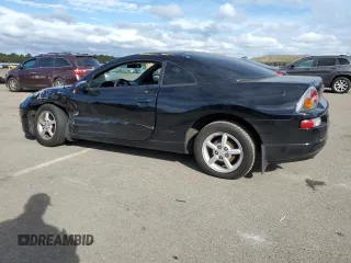 2003 Mitsubishi Eclipse RS with VIN 4A3AC34G23E124425, listed as a Copart auction lot 71744574 with 64,084 mi miles and Salvage Title. Bid and sale history available at DreamBid. Image 2.