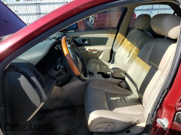 2005 Cadillac CTS with VIN 1G6DP567450133207, listed as a Copart auction lot 74300184 with 0 mi miles and Salvage Title. Bid and sale history available at carsss.com. Image 7.