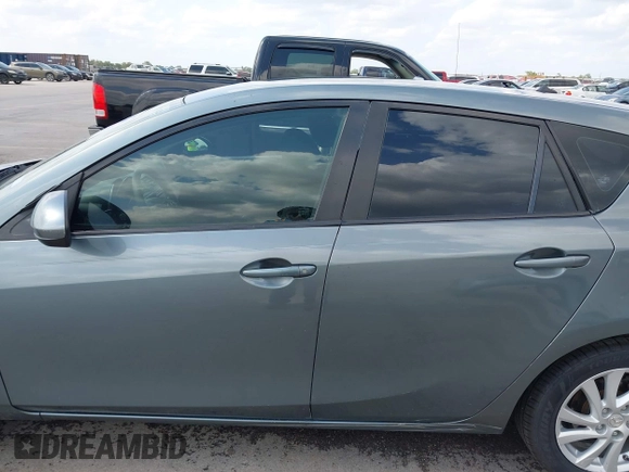 2012 Mazda Mazda3 i Touring with VIN JM1BL1L73C1562553, listed as a IAAI auction lot 42073390 with 227,269 mi miles. Bid and sale history available at carsss.com. Image 15.