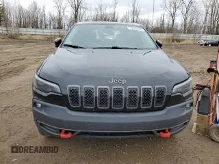 2019 Jeep Cherokee Trailhawk with VIN 1C4PJMBX7KD341534, listed as a Copart auction lot 52352765 with 207,532 mi miles and Salvage Title. Bid and sale history available at DreamBid. Image 5.