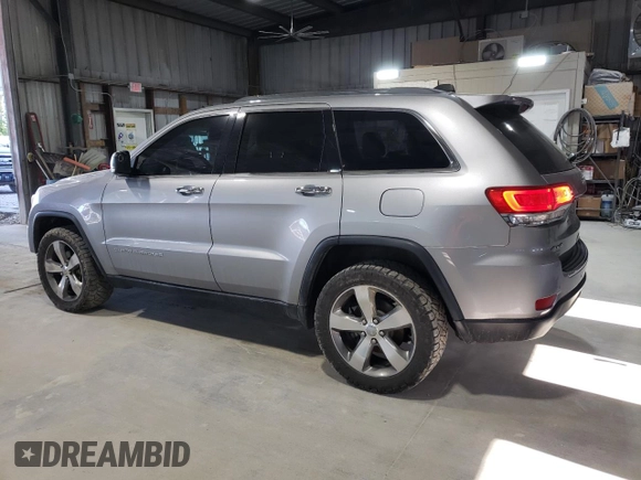 2015 Jeep Grand Cherokee Limited with VIN 1C4RJFBG2FC878523, listed as a Copart auction lot 51853755 with 124,743 mi miles and Salvage Title. Bid and sale history available at carsss.com. Image 2.