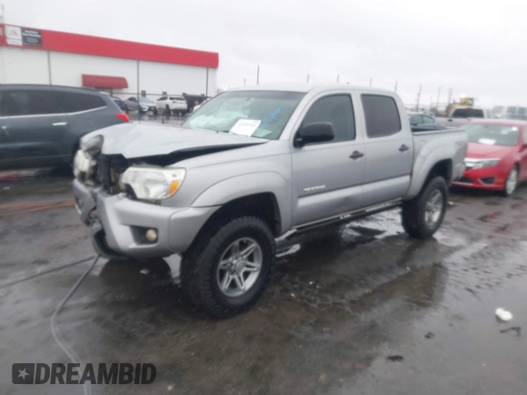 2014 Toyota Tacoma with VIN 3TMLU4EN2EM161239, listed as a IAAI auction lot 41536944 with 136,299 mi miles. Bid and sale history available at carsss.com. Image 21.