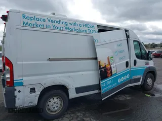 2014 Ram ProMaster Cargo with VIN 3C6URVHGXEE117547, listed as a IAAI auction lot 41904561 with 205,300 mi miles and . Bid and sale history available at DreamBid. Image 17.