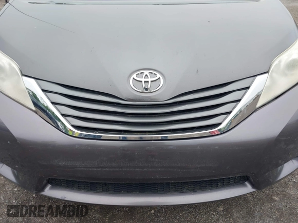 2014 Toyota Sienna XLE with VIN 5TDYK3DC0ES436502, listed as a IAAI auction lot 42180990 with 154,839 mi miles and . Bid and sale history available at DreamBid. Image 22.