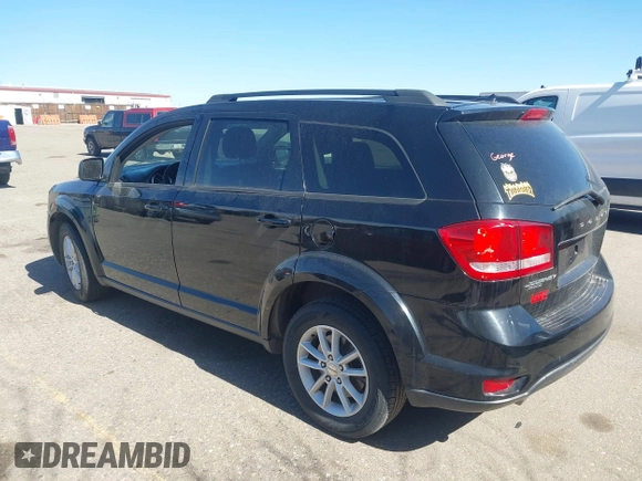 2016 Dodge Journey SXT with VIN 3C4PDDBG3GT215910, listed as a IAAI auction lot 41798779 with 165,505 mi miles. Bid and sale history available at carsss.com. Image 3.