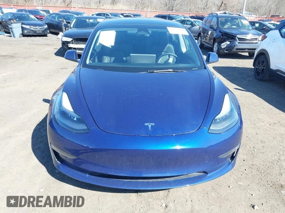 2023 Tesla Model 3 with VIN 5YJ3E1EA2PF690335, listed as a IAAI auction lot 41732701 with 22,238 mi miles and . Bid and sale history available at DreamBid. Image 12.