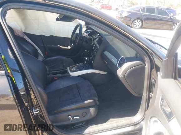 2014 Audi S4 Premium Plus with VIN WAUBGAFL9EA089416, listed as a IAAI auction lot 41879427 with 121,448 mi miles. Bid and sale history available at carsss.com. Image 5.
