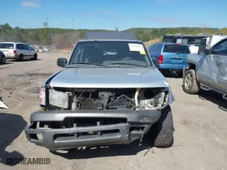 2001 Nissan Xterra XE with VIN 5N1ED28T01C511272, listed as a IAAI auction lot 41639337 with 305,569 mi miles. Bid and sale history available at carsss.com. Image 6.