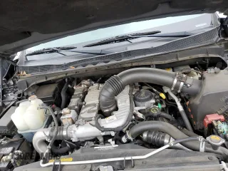 2016 Nissan Titan SL z VIN 1N6BA1F29GN515240, wystawiony jako Copart lot #45185835 z przebiegiem 137 164 mil mil oraz Czysty tytuł • Clean title. Historia ofert i sprzedaży dostępna na DreamBid. Obrazek 11.