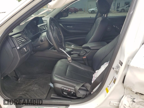 2012 BMW 3 Series 328i with VIN WBA3A5C55CF259337, listed as a Copart auction lot 63327925 with 132,019 mi miles and Salvage title. Bid and sale history available at DreamBid. Image 7.