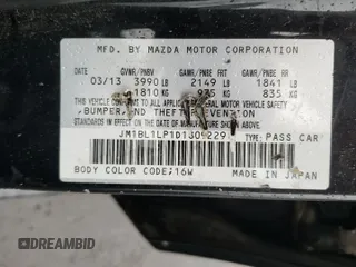 2013 Mazda 3 i Touring with VIN JM1BL1LP1D1809229, listed as a Copart auction lot 55988515 with 125,006 mi miles and Salvage title. Bid and sale history available at DreamBid. Image 13.