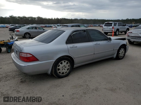 2004 Acura RL w/Navigation System z VIN JH4KA96664C003428, wystawiony jako Copart lot #87115774 z przebiegiem 164 527 mil mil oraz Szkoda całkowita • Salvage title. Historia ofert i sprzedaży dostępna na DreamBid. Obrazek 3.