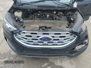2020 Ford Edge SEL z VIN 2FMPK3J90LBA44070, wystawiony jako Copart lot #54606065 z przebiegiem 63 153 mil mil oraz Szkoda całkowita • Salvage title. Historia ofert i sprzedaży dostępna na DreamBid. Obrazek 11.