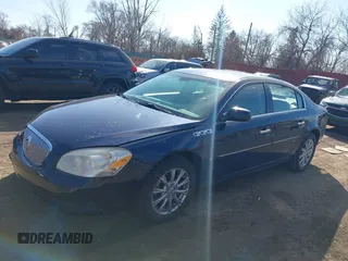 2009 Buick Lucerne CXL with VIN 1G4HD57M09U135641, listed as a IAAI auction lot 41823615 with 107,479 mi miles and . Bid and sale history available at DreamBid. Image 2.