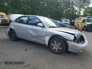 2001 Hyundai Elantra GLS with VIN KMHDN45D01U241519, listed as a Copart auction lot 61551095 with 201,343 mi miles and Salvage title. Bid and sale history available at DreamBid. Image 4.