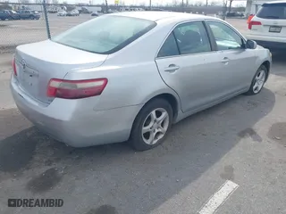 2007 Toyota Camry CE with VIN 4T1BE46K47U043586, listed as a IAAI auction lot 41698892 with 220,617 mi miles. Bid and sale history available at carsss.com. Image 4.