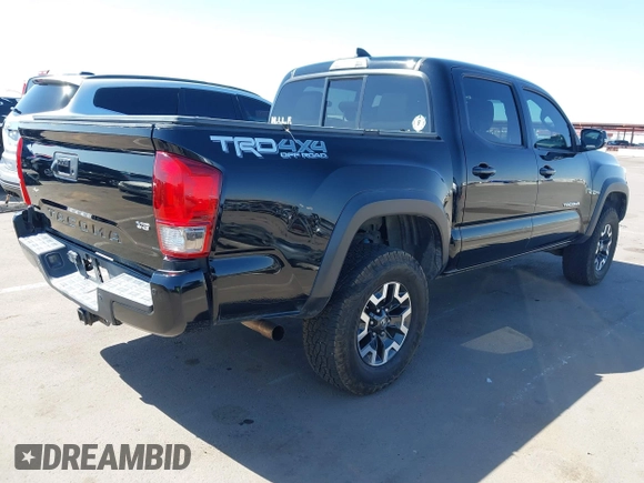 2016 Toyota Tacoma SR with VIN 3TMCZ5AN3GM019210, listed as a IAAI auction lot 42003617 with 171,581 mi miles. Bid and sale history available at carsss.com. Image 4.