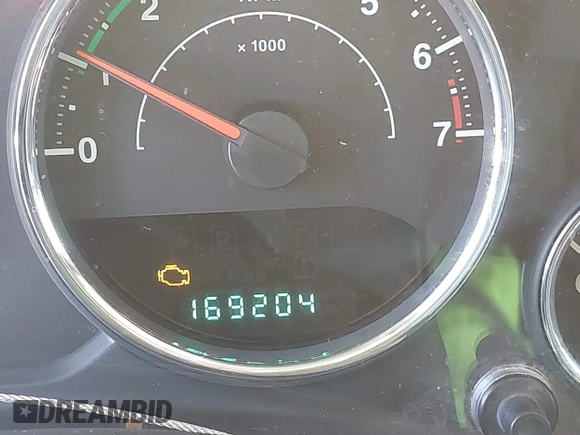 2012 Jeep Wrangler Sport with VIN 1C4AJWAG1CL286332, listed as a IAAI auction lot 42408102 with 169,204 mi miles and . Bid and sale history available at DreamBid. Image 15.