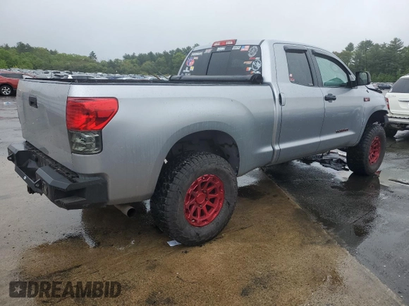 2010 Toyota Tundra with VIN 5TFUY5F15AX123633, listed as a Copart auction lot 57053995 with 85,716 mi miles and Salvage title. Bid and sale history available at DreamBid. Image 3.