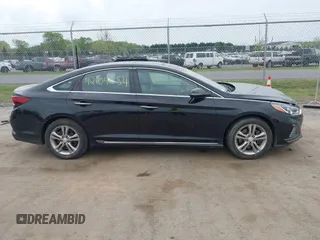2018 Hyundai Sonata Sport with VIN 5NPE34AF0JH710477, listed as a IAAI auction lot 42104684 with 158,260 mi miles and . Bid and sale history available at carsss.com. Image 14.