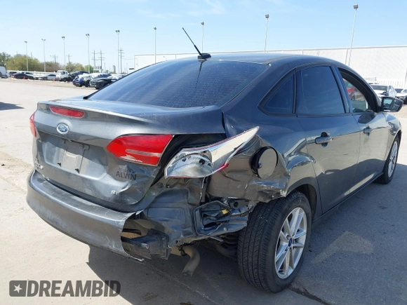 2018 Ford Focus SE with VIN 1FADP3F2XJL302358, listed as a IAAI auction lot 41807622 with 76,145 mi miles. Bid and sale history available at carsss.com. Image 6.