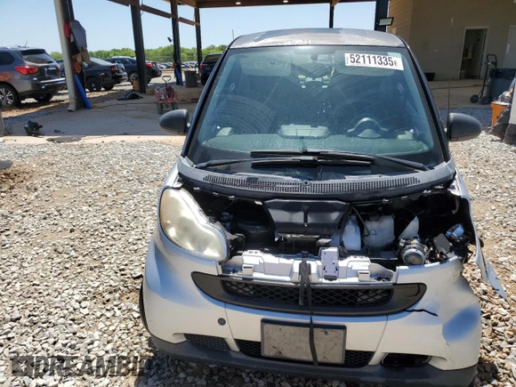 2009 Smart fortwo Pure with VIN WMEEJ31X49K224990, listed as a Copart auction lot 52111335 with 72,317 mi miles and Salvage Title. Bid and sale history available at carsss.com. Image 5.