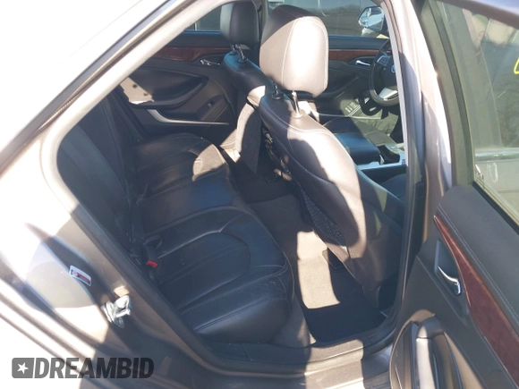 2012 Cadillac CTS Premium with VIN 1G6DS5E3XC0128264, listed as a IAAI auction lot 41964295 with 117,889 mi miles and . Bid and sale history available at DreamBid. Image 8.