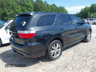 2012 Dodge Durango R/T with VIN 1C4SDHCT7CC266703, listed as a IAAI auction lot 42613171 with 168,290 mi miles and . Bid and sale history available at DreamBid. Image 4.
