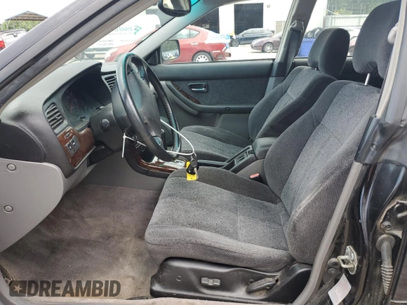 2000 Subaru Legacy with VIN 4S3BH6458Y7305971, listed as a Copart auction lot 59620325 with 135,546 mi miles and Salvage title. Bid and sale history available at DreamBid. Image 7.