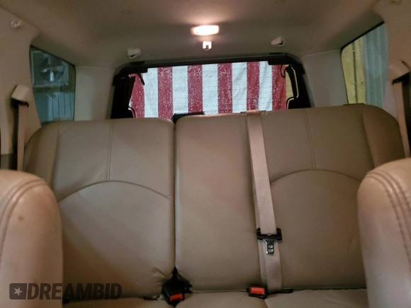 2009 Mercury Mariner Premier with VIN 4M2CU97749KJ15561, listed as a Copart auction lot 86042054 with 153,073 mi miles and Salvage Title. Bid and sale history available at carsss.com. Image 10.