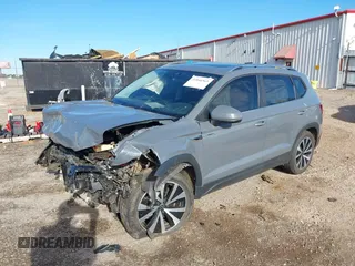 2022 Volkswagen Taos SE z VIN 3VVLX7B26NM077297, wystawiony jako IAAI lot #41846563 z przebiegiem 63 161 mil mil oraz . Historia ofert i sprzedaży dostępna na DreamBid. Obrazek 2.