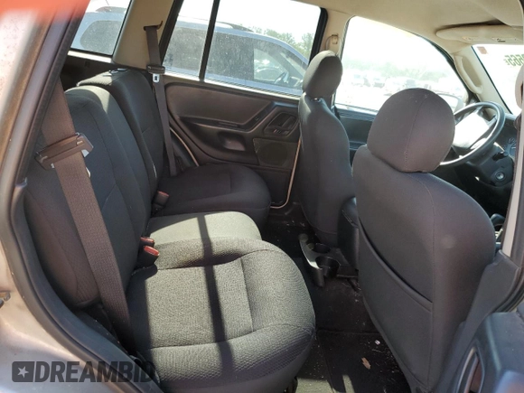 2004 Jeep Grand Cherokee Laredo with VIN 1J4GW48S34C307347, listed as a Copart auction lot 55749565 with Not provided miles and Salvage title. Bid and sale history available at DreamBid. Image 11.