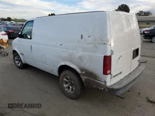 2001 GMC Safari Cargo with VIN 1GTDM19W71B510158, listed as a Copart auction lot 87296804 with 214,236 mi miles and Salvage Title. Bid and sale history available at carsss.com. Image 2.