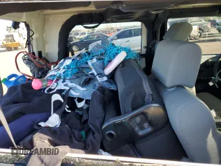 2009 Jeep Wrangler Rubicon with VIN 1J4GA64169L765933, listed as a Copart auction lot 84963104 with 107,190 mi miles and Salvage Title. Bid and sale history available at DreamBid. Image 10.