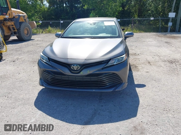 2019 Toyota Camry LE with VIN 4T1B11HK4KU286959, listed as a IAAI auction lot 42063344 with 92,481 mi miles and . Bid and sale history available at DreamBid. Image 12.