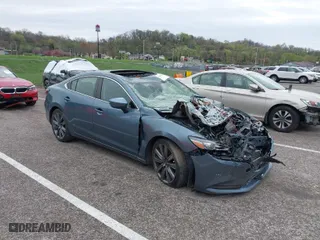 2018 Mazda Mazda6 Grand Touring with VIN JM1GL1TY7J1326256, listed as a IAAI auction lot 41924311 with 99,057 mi miles. Bid and sale history available at carsss.com. Image 1.