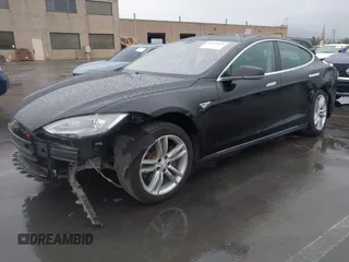 2013 Tesla Model S with VIN 5YJSA1CN0DFP20053, listed as a IAAI auction lot 41470660 with 61,568 mi miles and . Bid and sale history available at DreamBid. Image 20.