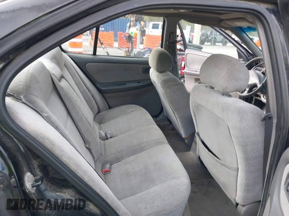 2001 Nissan Altima GXE with VIN 1N4DL01D51C201747, listed as a IAAI auction lot 41970911 with 294,383 mi miles. Bid and sale history available at carsss.com. Image 8.