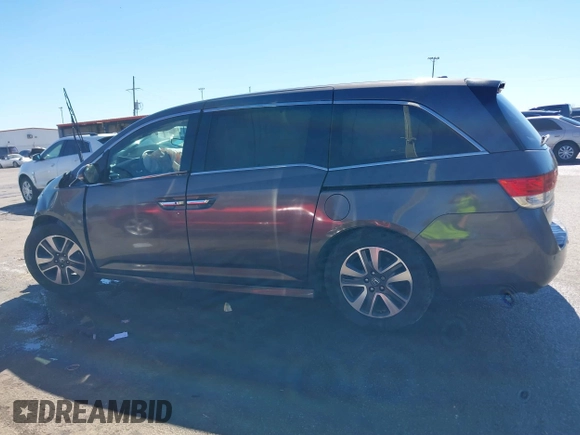 2016 Honda Odyssey Touring Elite with VIN 5FNRL5H97GB010275, listed as a IAAI auction lot 41655328 with Not Provided miles. Bid and sale history available at carsss.com. Image 14.