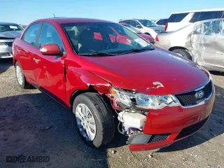 2010 Kia Forte EX with VIN KNAFU4A22A5302042, listed as a IAAI auction lot 41875786 with 236,529 mi miles. Bid and sale history available at carsss.com. Image 1.