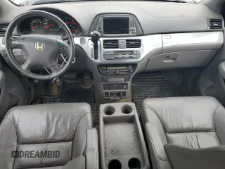2008 Honda Odyssey EX-L z VIN 5FNRL38778B095946, wystawiony jako Copart lot #54676585 z przebiegiem 213 337 mil mil oraz Czysty tytuł • Clean title. Historia ofert i sprzedaży dostępna na DreamBid. Obrazek 8.