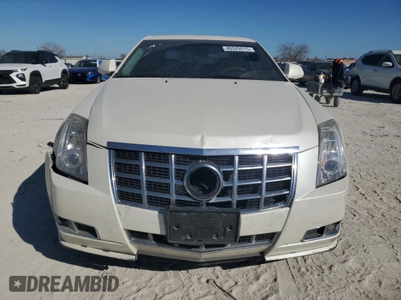 2013 Cadillac CTS Premium z VIN 1G6DP5E33D0153588, wystawiony jako Copart lot #46529515 z przebiegiem 103 980 mil mil oraz Czysty tytuł • Clean title. Historia ofert i sprzedaży dostępna na DreamBid. Obrazek 5.