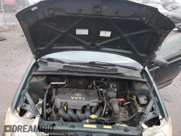2000 Toyota ECHO with VIN JTDAT1231Y0041399, listed as a Copart auction lot 83774514 with 128,465 mi miles and Salvage Title. Bid and sale history available at DreamBid. Image 11.