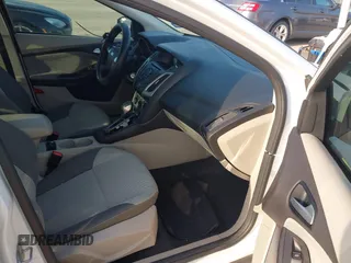 2014 Ford Focus SE with VIN 1FADP3F26EL163285, listed as a IAAI auction lot 42174124 with 172,016 mi miles and . Bid and sale history available at carsss.com. Image 5.
