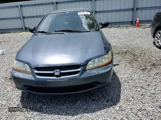 1999 Honda Accord EX z VIN 1HGCG5651XA061646, wystawiony jako Copart lot #60443325 z przebiegiem 164 296 mil mil oraz Szkoda całkowita • Salvage title. Historia ofert i sprzedaży dostępna na DreamBid. Obrazek 13.