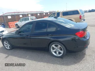 2014 BMW 3 Series 328i xDrive with VIN WBA3B3C56EJ981322, listed as a IAAI auction lot 42104530 with 104,376 mi miles. Bid and sale history available at carsss.com. Image 14.