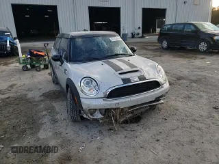 2014 MINI Clubman S z VIN WMWZG3C52ETY33460, wystawiony jako Copart lot #82752834 z przebiegiem 130 015 mil mil oraz Szkoda całkowita • Salvage title. Historia ofert i sprzedaży dostępna na DreamBid. Obrazek 11.