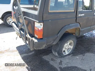 1995 Jeep Cherokee Sport with VIN 1J4FJ68S5SL541413, listed as a IAAI auction lot 42722408 with 335,432 mi miles and . Bid and sale history available at DreamBid. Image 6.